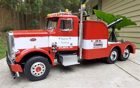 Fully Detailed Cab, Engine, Drive Train, Interior and Chassis Newly Tooled Tires with Pad Printed Firestone Sidewalls Loads of Chrome Components with Over 250 Parts. . Peterbilt wrecker model